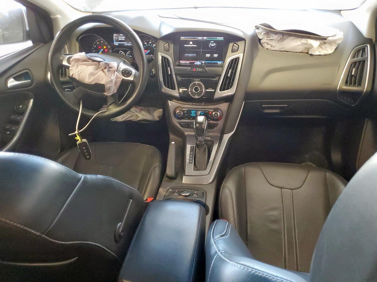 2014 Ford Focus Titanium VIN: 1FADP3N23EL192924 Lot: 85731195