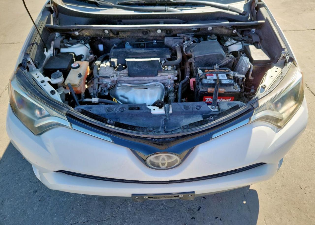 2018 Toyota Rav4 Le VIN: JTMZFREV2JJ210142 Lot: 86136035