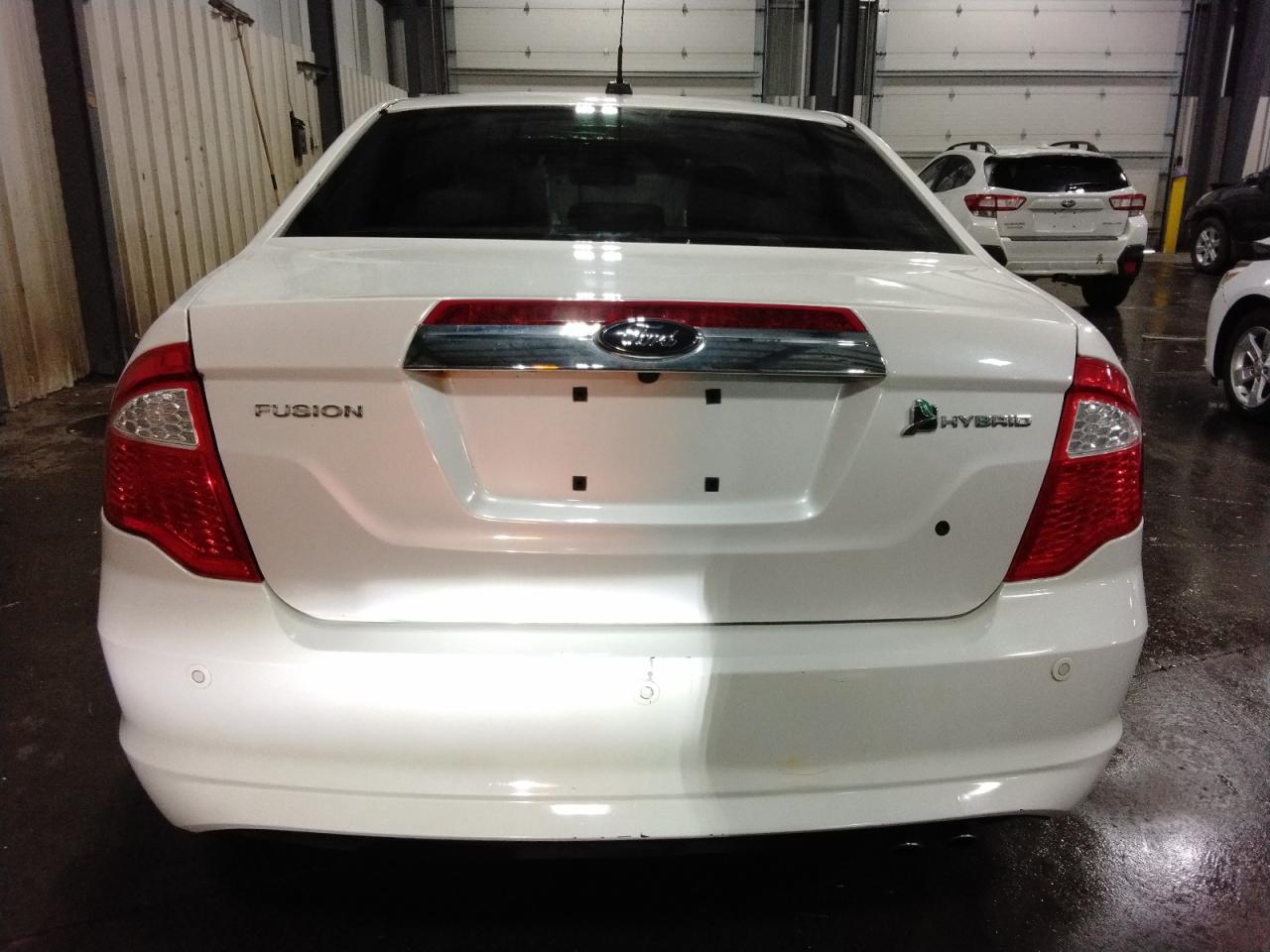 2010 Ford Fusion Hybrid VIN: 3FADP0L35AR220499 Lot: 86827055