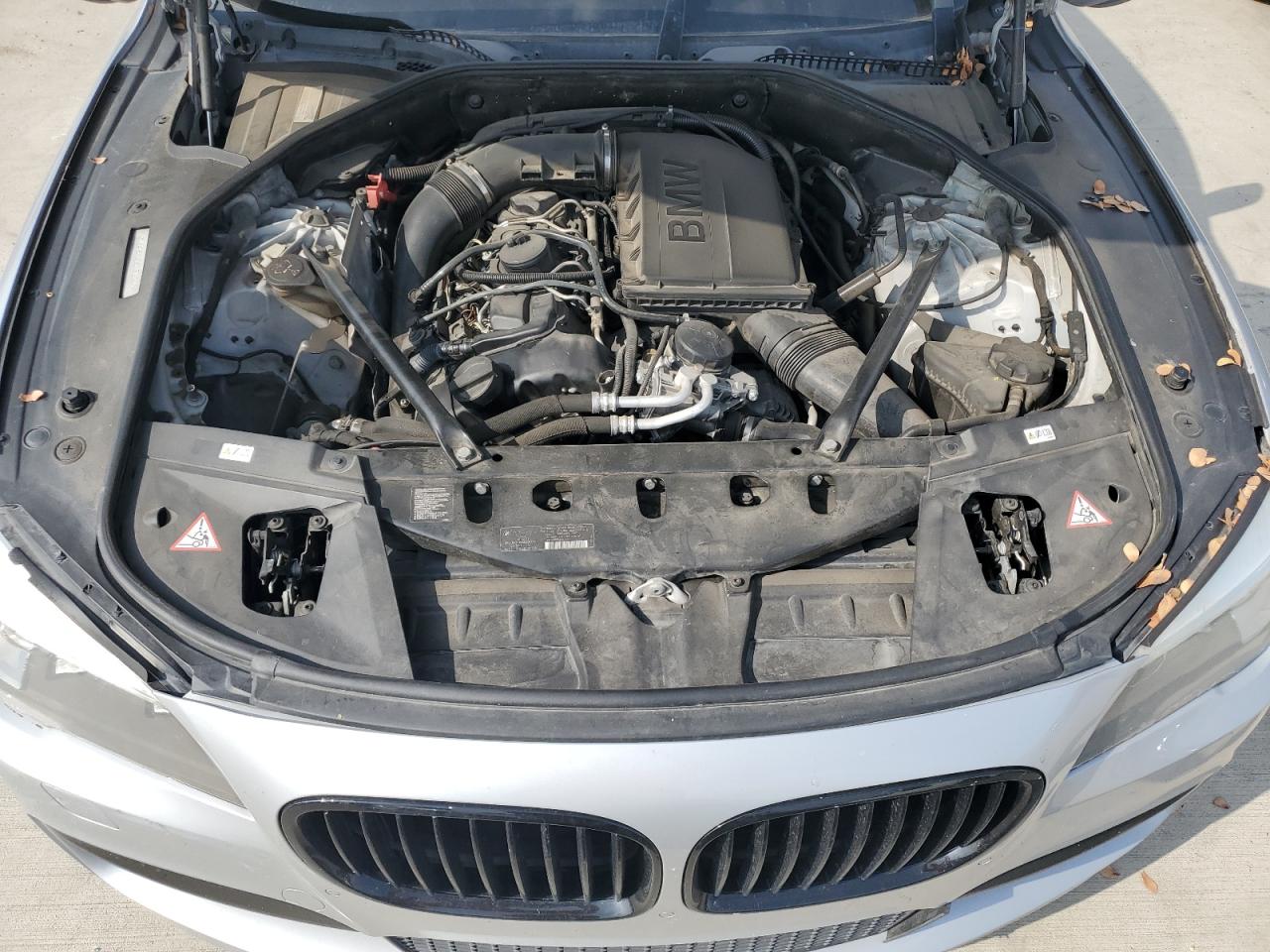 2014 BMW 740 Li VIN: WBAYE4C57ED137985 Lot: 89680015