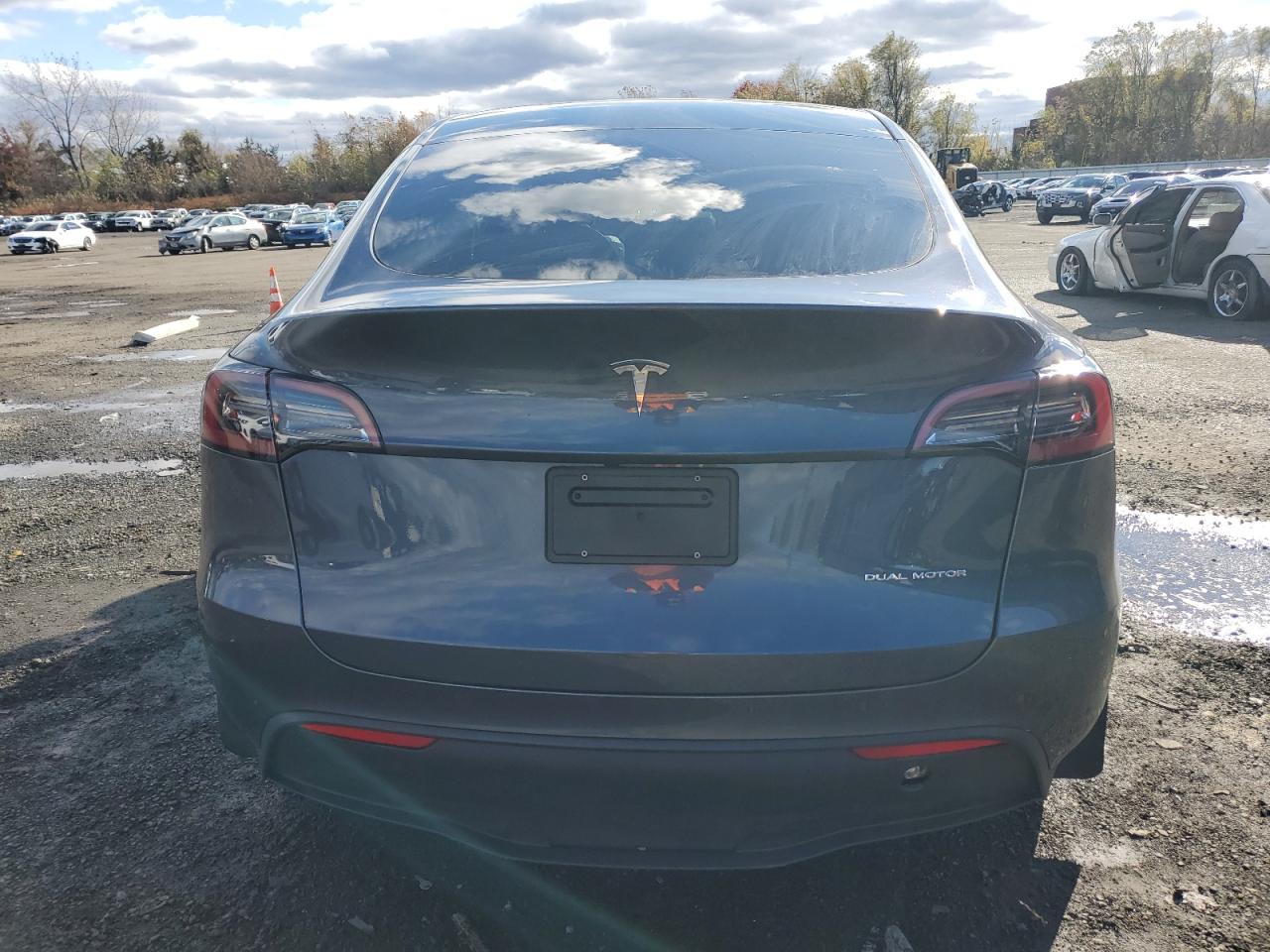 2023 Tesla Model Y VIN: 7SAYGDEE2PF758186 Lot: 90446595