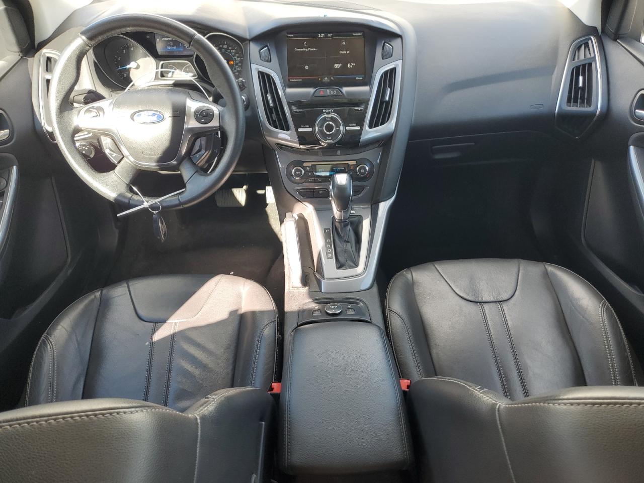 2012 Ford Focus Titanium VIN: 1FAHP3N23CL160795 Lot: 84771465