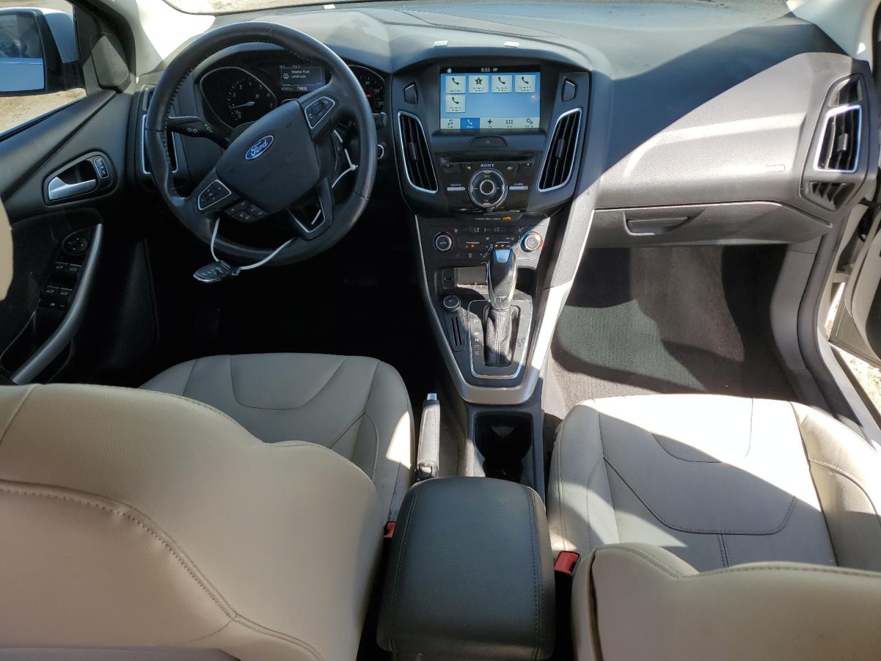 2016 Ford Focus Titanium VIN: 1FADP3J21GL230515 Lot: 85524355
