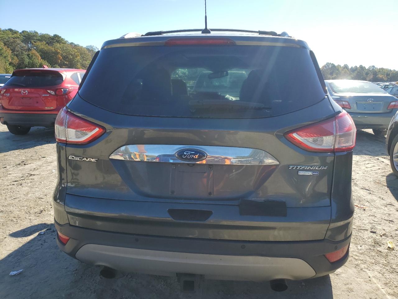 2016 Ford Escape Titanium VIN: 1FMCU9J95GUC36449 Lot: 86858025