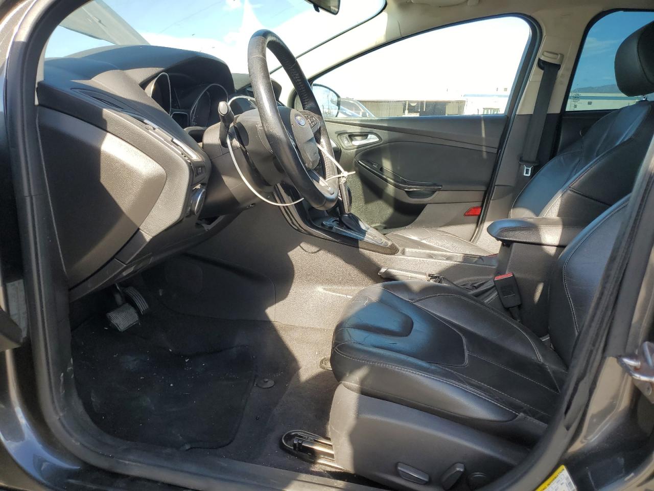 2015 Ford Focus Titanium VIN: 1FADP3J24FL387048 Lot: 82431245