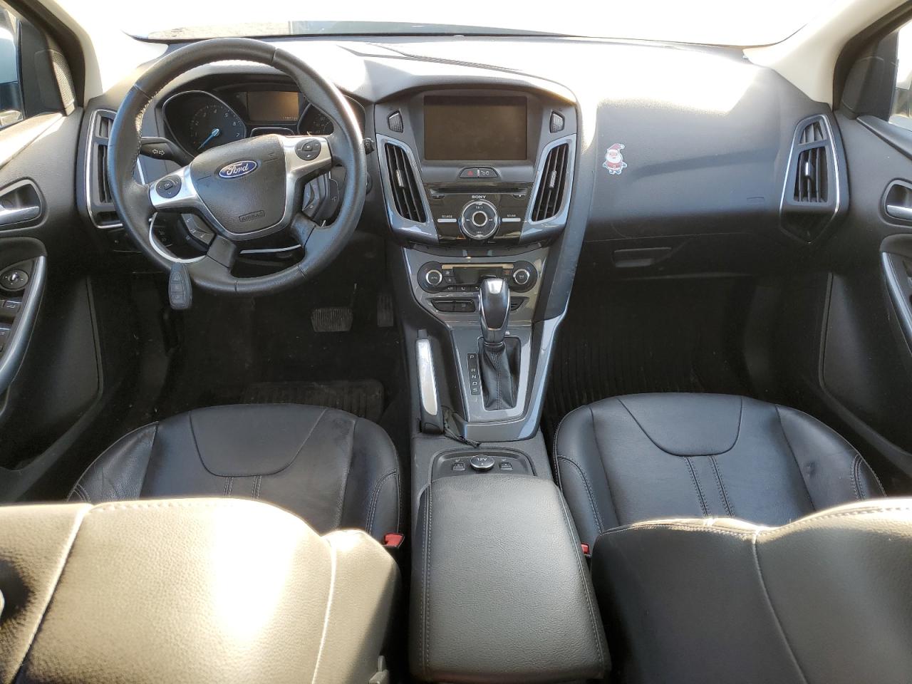 2012 Ford Focus Titanium VIN: 1FAHP3N21CL202879 Lot: 80838925