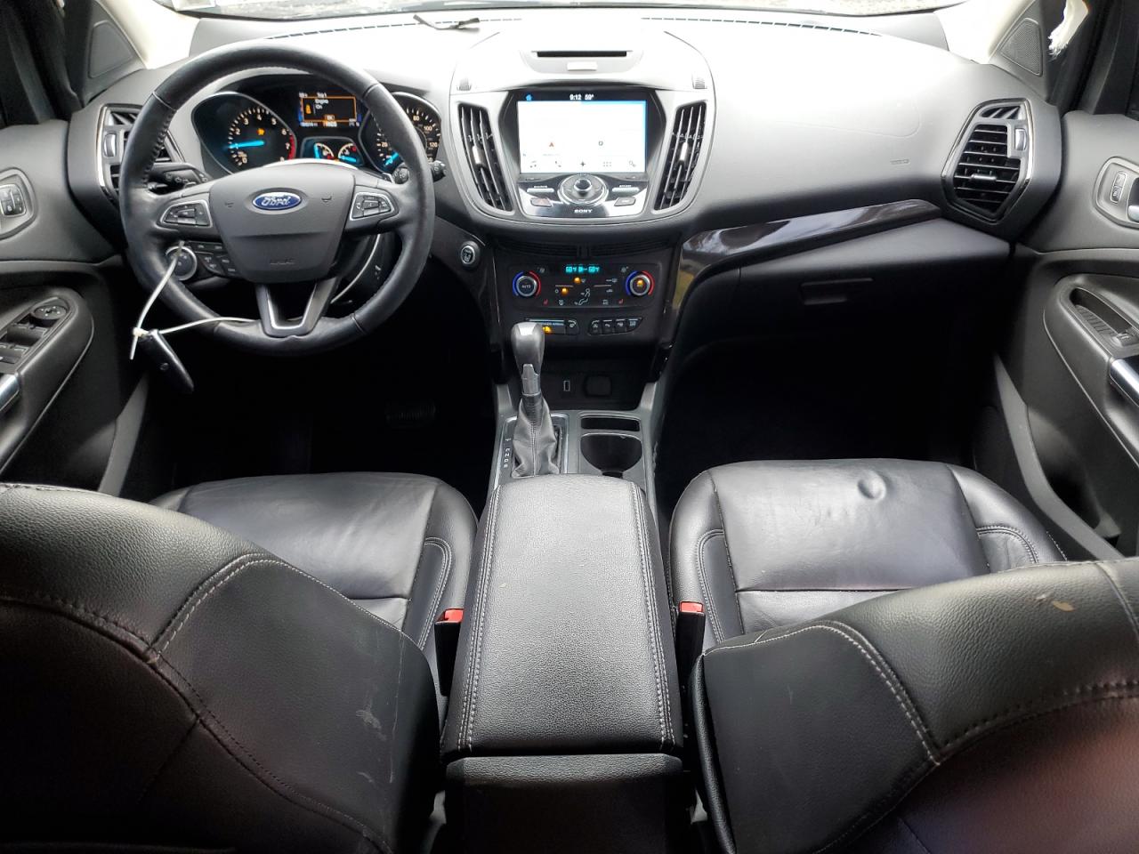 2017 Ford Escape Titanium VIN: 1FMCU0J90HUB64587 Lot: 86682055