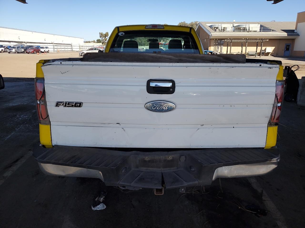 2011 Ford F150 VIN: 1FTMF1CMXBKD98216 Lot: 82311385