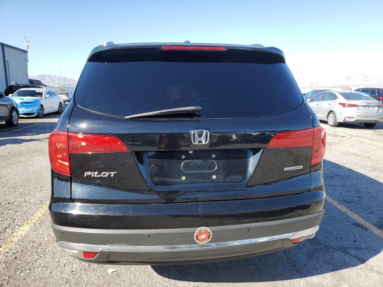 2018 Honda Pilot Touring VIN: 5FNYF5H95JB017056 Lot: 85129355