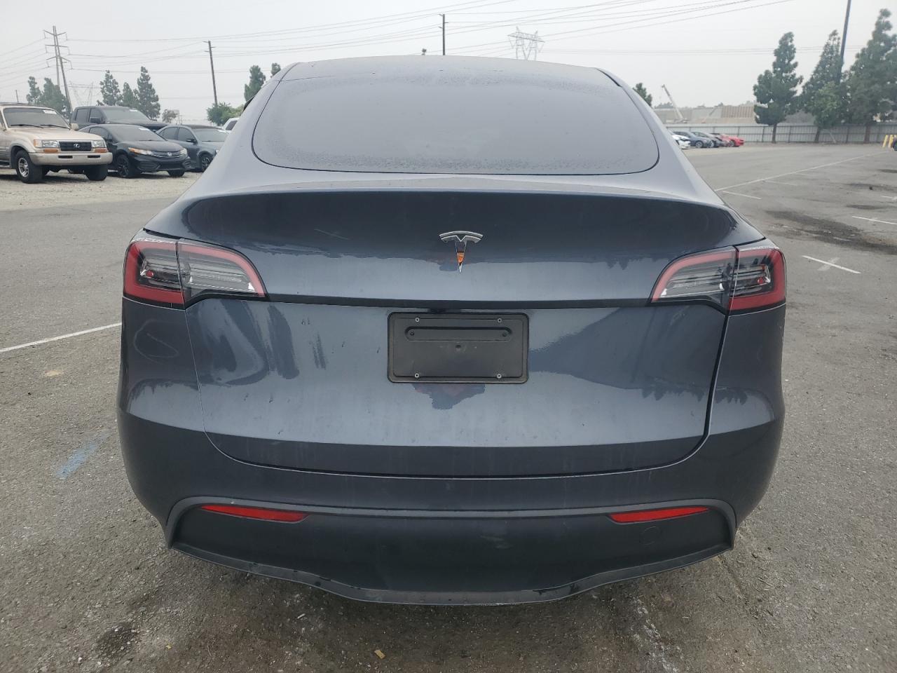 2023 Tesla Model Y VIN: 7SAYGDED7PF959203 Lot: 85182535