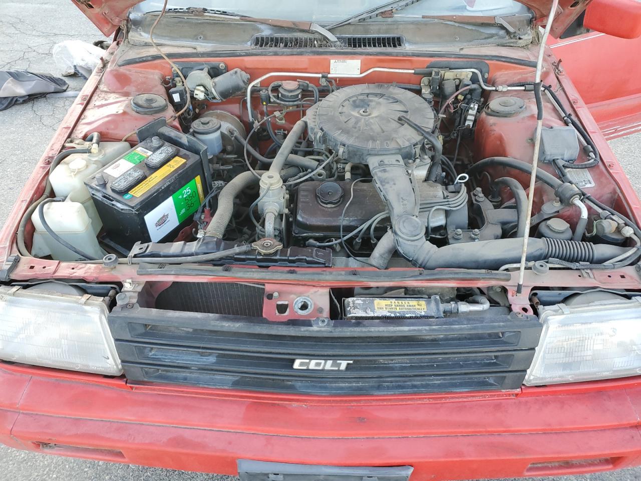 1988 Dodge Colt Dl VIN: JB3BA34K9JU080994 Lot: 84350235