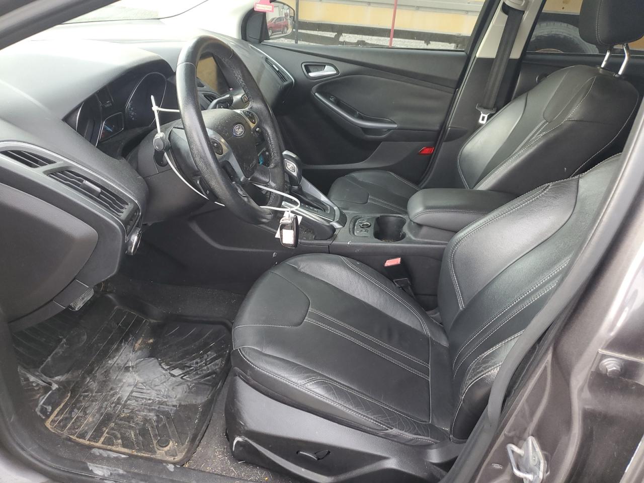 2012 Ford Focus Titanium VIN: 1FAHP3N2XCL220197 Lot: 86258065