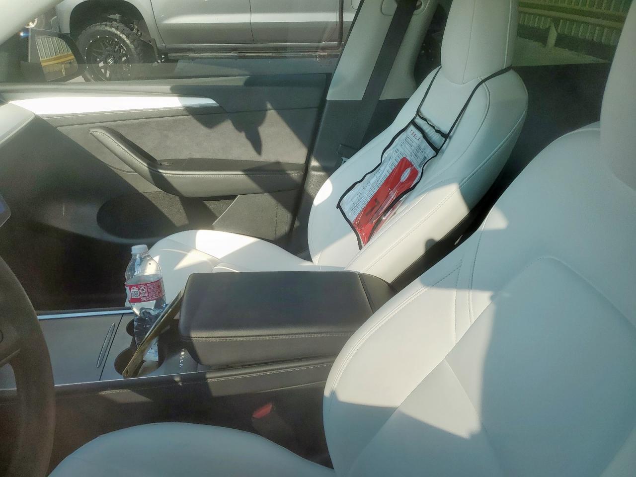 2023 Tesla Model Y VIN: 7SAYGDEF3PF675357 Lot: 84400385