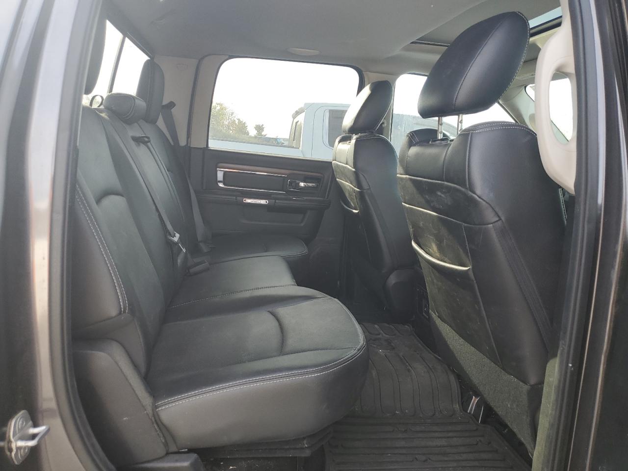 2015 Ram 1500 Laramie VIN: 1C6RR7NM2FS609290 Lot: 81998225