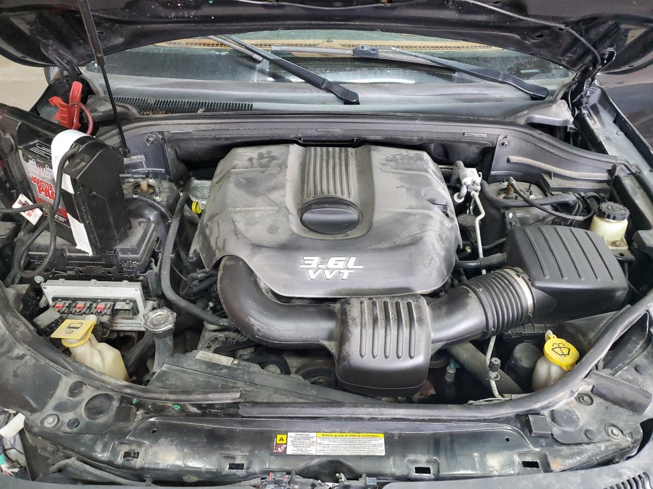 2012 Jeep Grand Cherokee Overland VIN: 1C4RJFCG3CC176690 Lot: 83803195