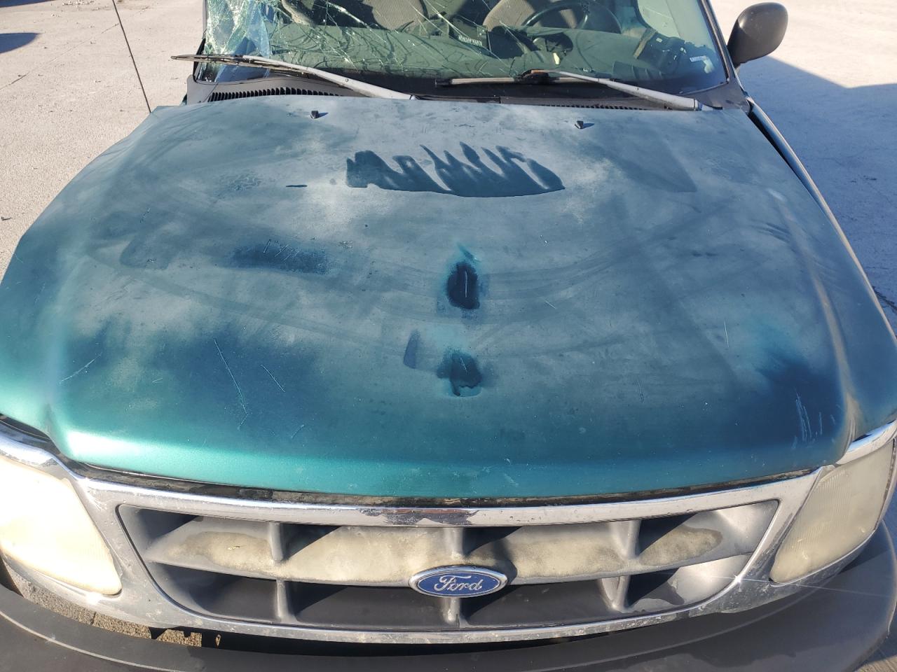 1998 Ford F150 VIN: 2FTZX1864WCA87033 Lot: 86407055