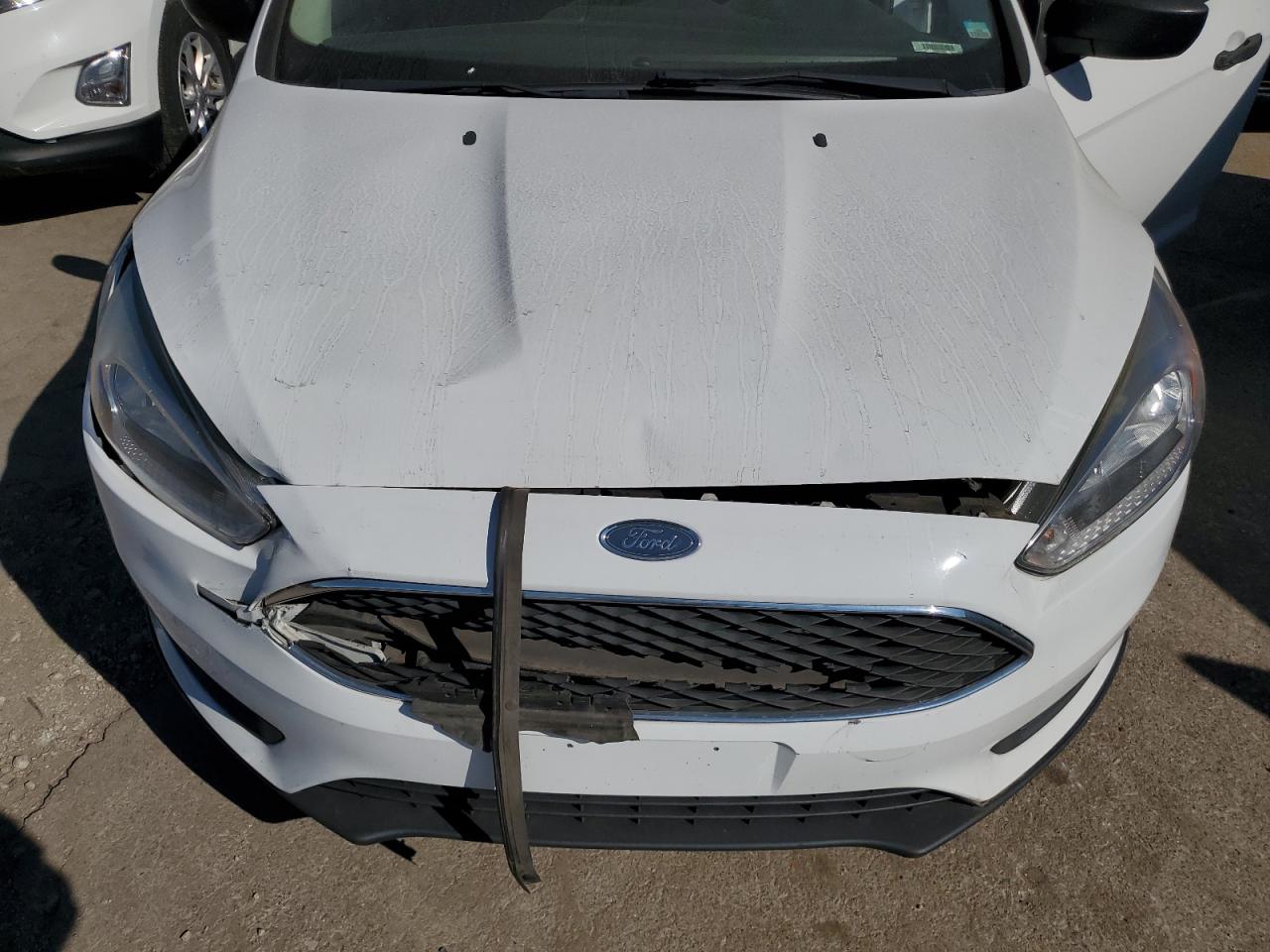 2018 Ford Focus S VIN: 1FADP3E26JL215865 Lot: 85100395