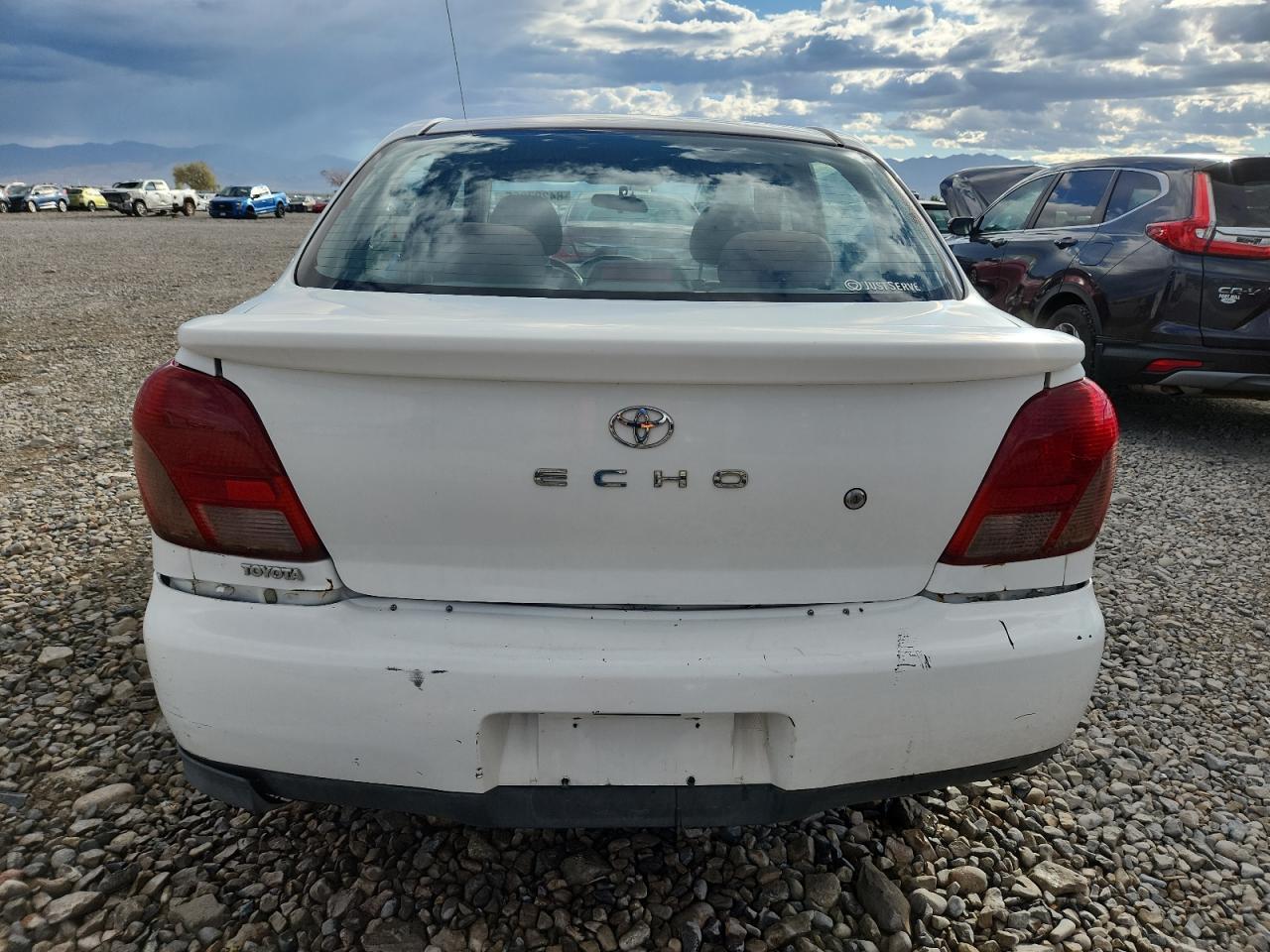 2002 Toyota Echo VIN: JTDBT123320220409 Lot: 84297355