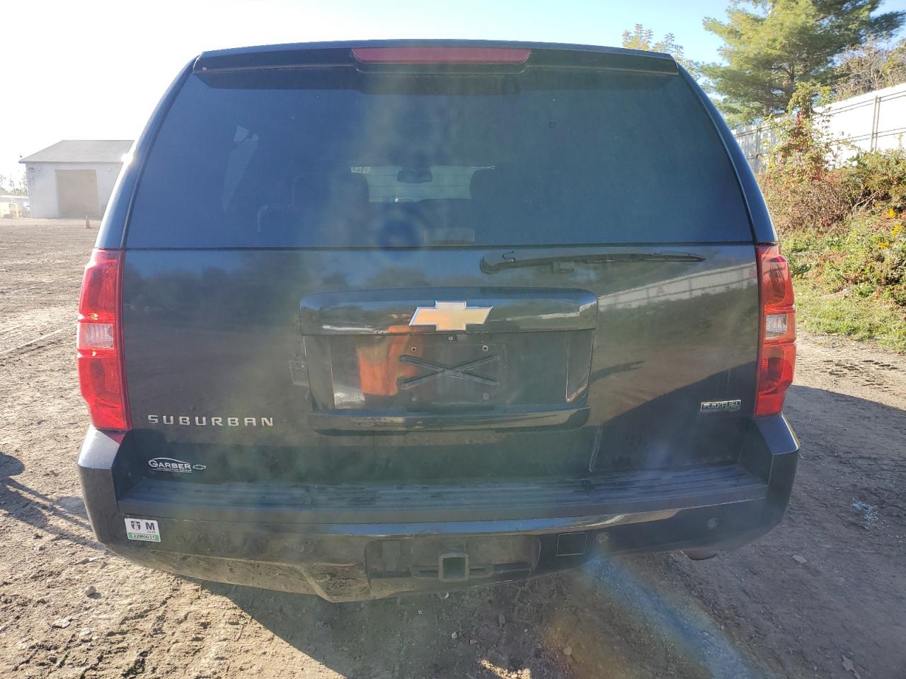 2011 Chevrolet Suburban K1500 Ls VIN: 1GNSKHE34BR180335 Lot: 82379145