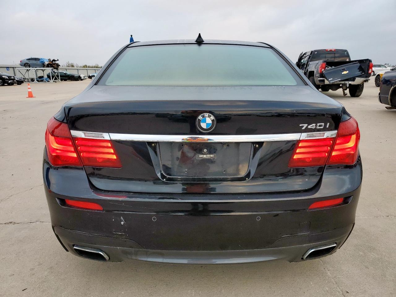 2014 BMW 740 I VIN: WBAYA6C5XED144517 Lot: 90255015