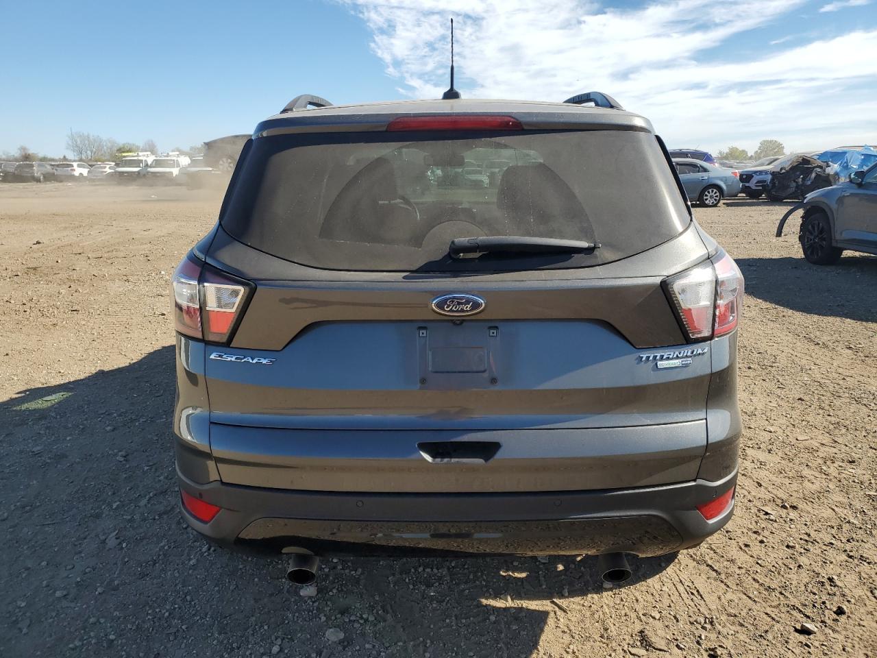 2017 Ford Escape Titanium VIN: 1FMCU9J9XHUD06030 Lot: 89730995