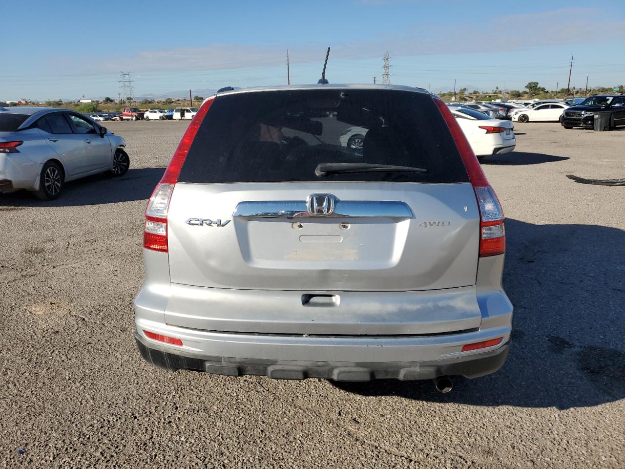 2010 Honda Cr-V Exl VIN: JHLRE4H7XAC000091 Lot: 82495845