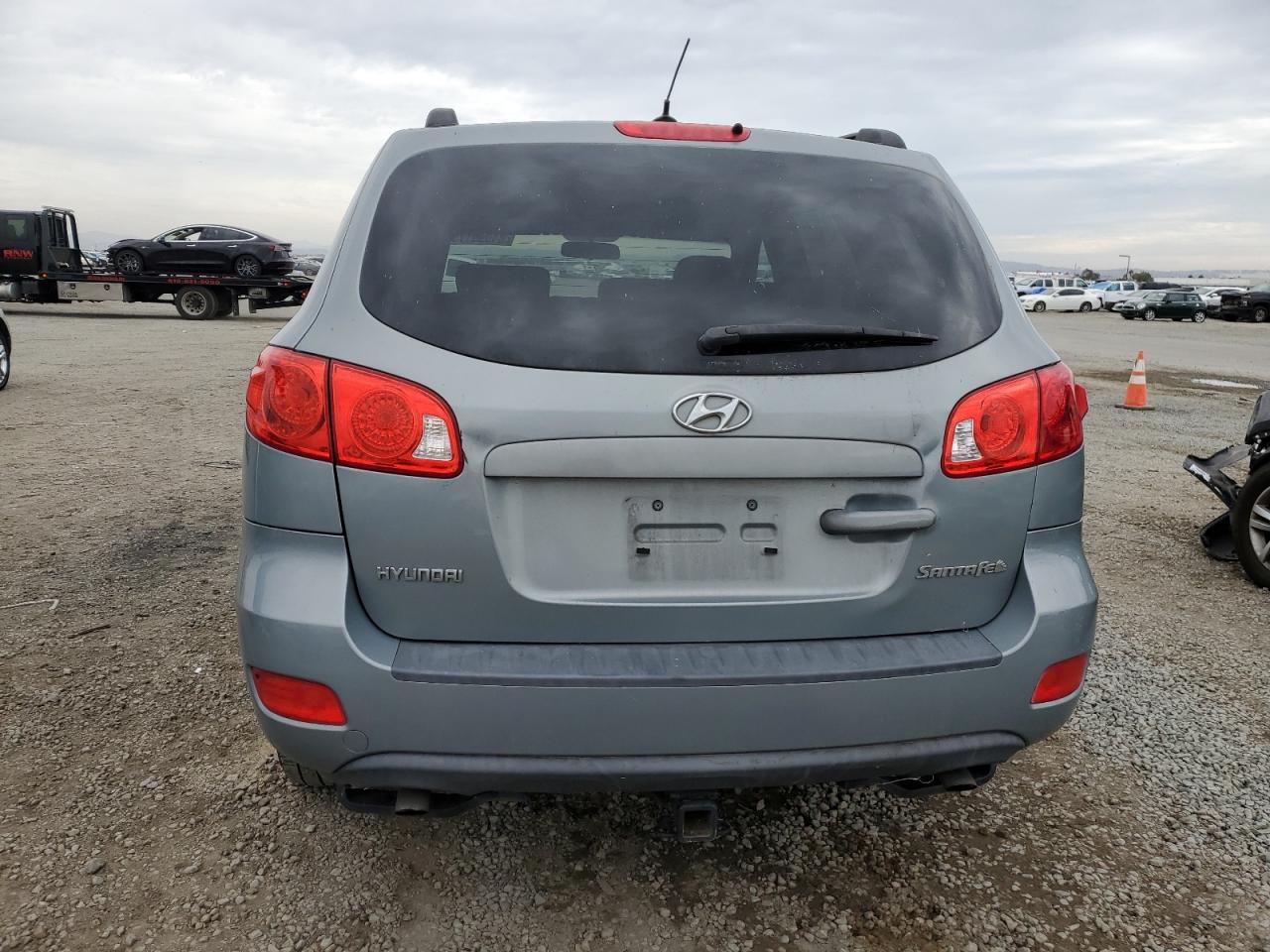 2009 Hyundai Santa Fe Gls VIN: 5NMSG13D19H297561 Lot: 84990175