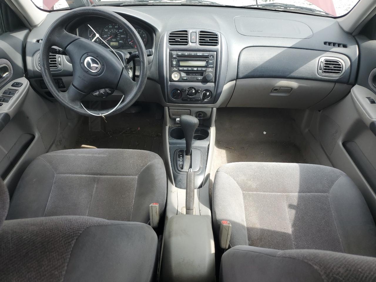 2002 Mazda Protege Dx VIN: JM1BJ225020636110 Lot: 81786975