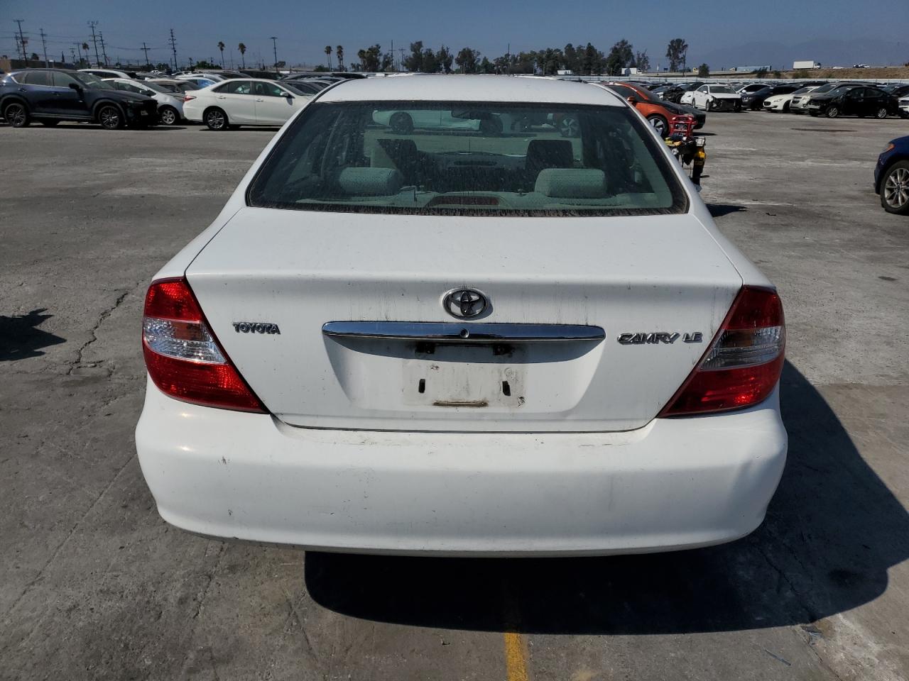2004 Toyota Camry Le VIN: 4T1BE32K14U297848 Lot: 85383705