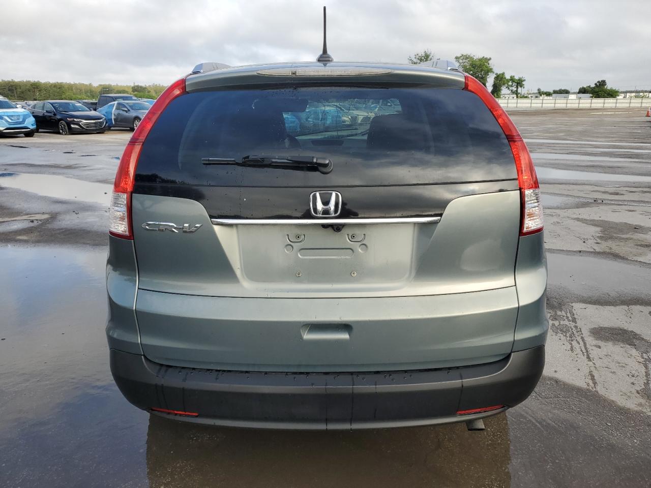 2012 Honda Cr-V Exl VIN: JHLRM3H7XCC003542 Lot: 85082665