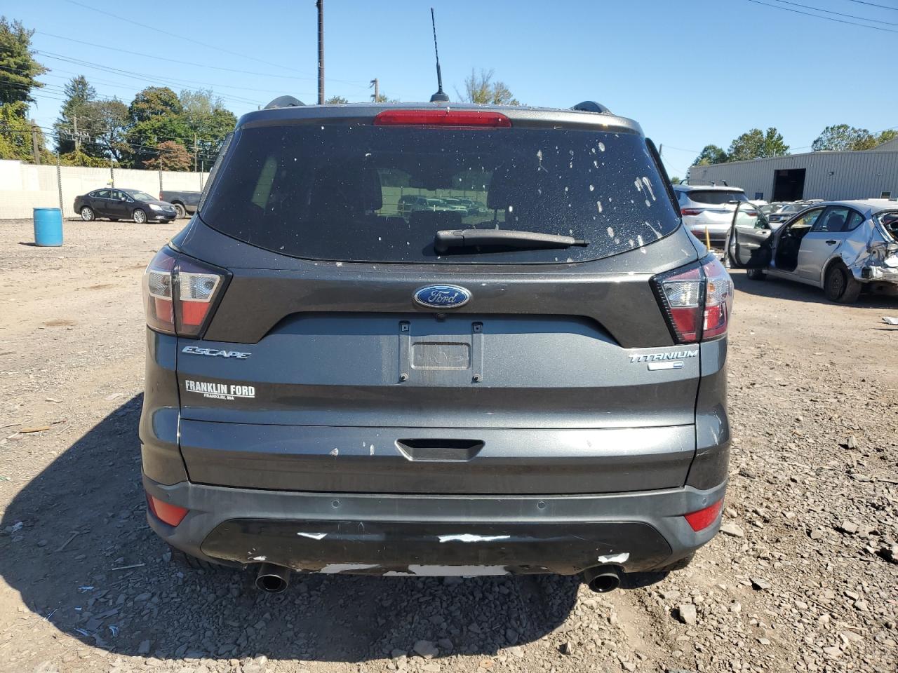 2017 Ford Escape Titanium VIN: 1FMCU9J95HUF00996 Lot: 84951835