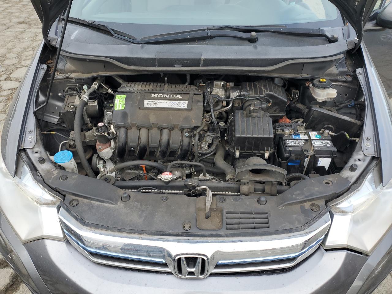 2012 Honda Insight VIN: JHMZE2H34CS005390 Lot: 82239245