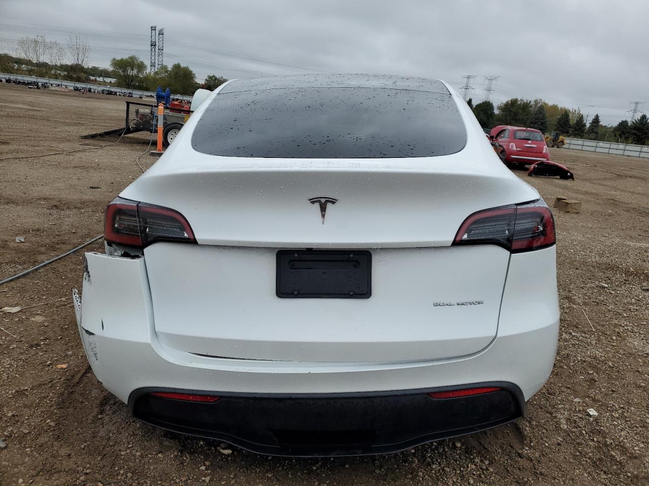 2023 Tesla Model Y VIN: 7SAYGAEE1PF593990 Lot: 86592595