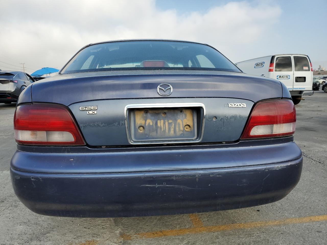 1999 Mazda 626 Es VIN: 1YVGF22C1X5885994 Lot: 82359785