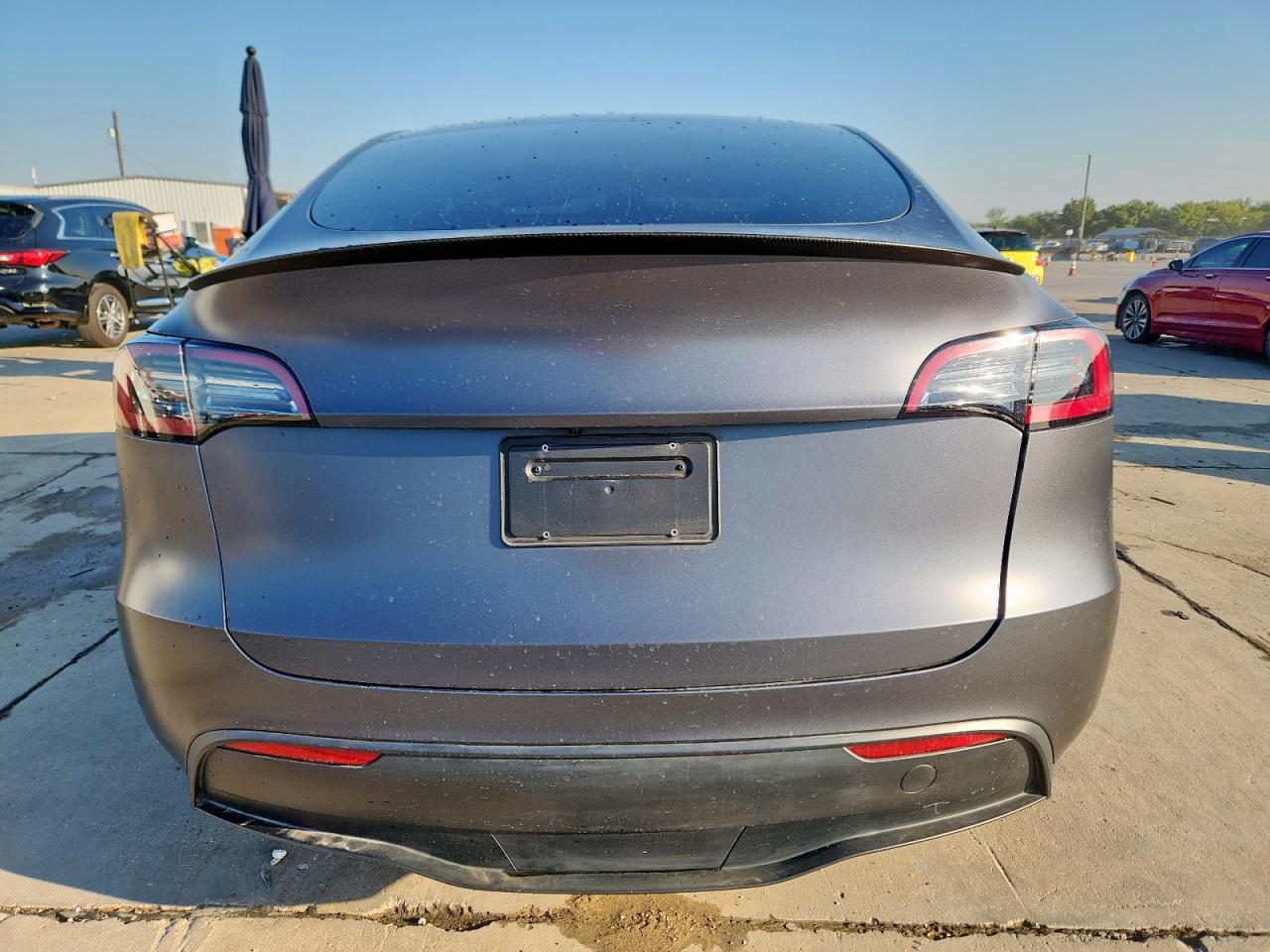 2023 Tesla Model Y VIN: 7SAYGDEF0PF704958 Lot: 85553275