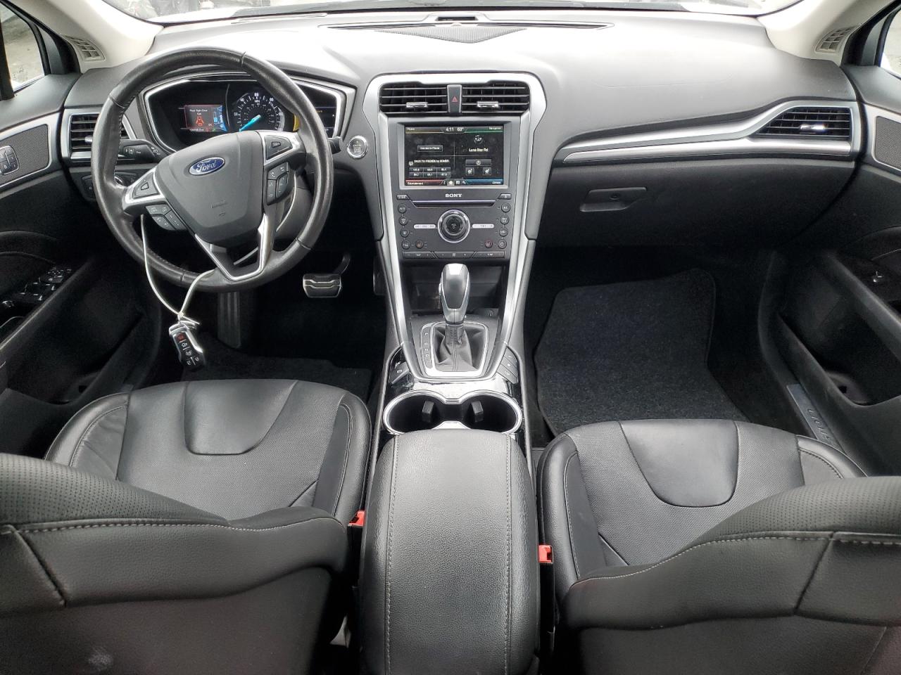 2016 Ford Fusion Titanium Phev VIN: 3FA6P0SU8GR194217 Lot: 82210555