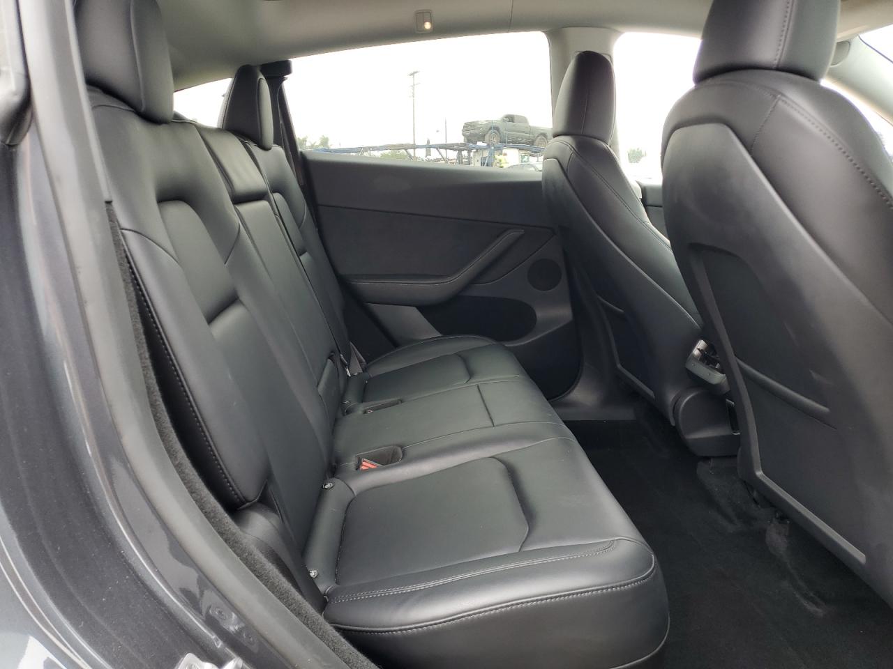 2023 Tesla Model Y VIN: 7SAYGDEE9PF889177 Lot: 82357825