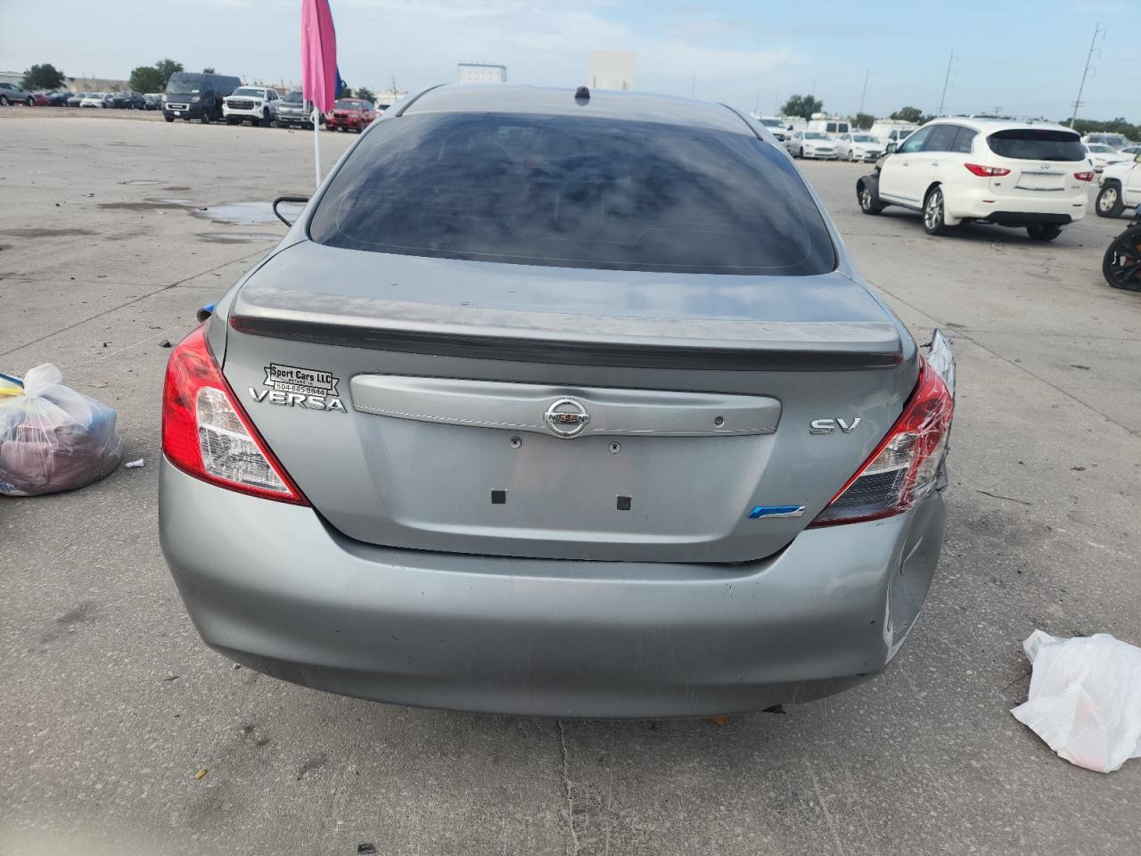 2012 Nissan Versa S VIN: 3N1CN7AP2CL931208 Lot: 84730295