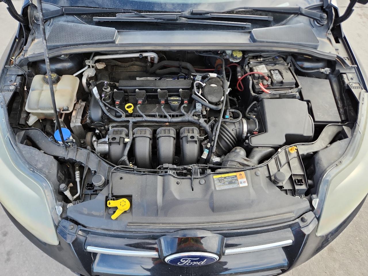 2014 Ford Focus Titanium VIN: 1FADP3J28EL224272 Lot: 86531015