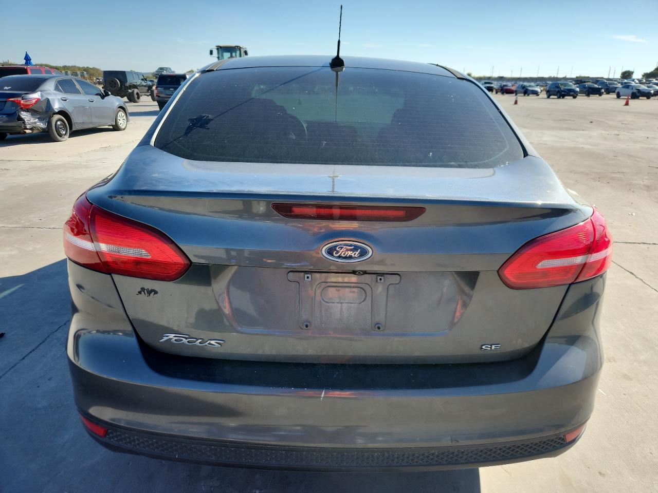 2018 Ford Focus Se VIN: 1FADP3F21JL210927 Lot: 82621365