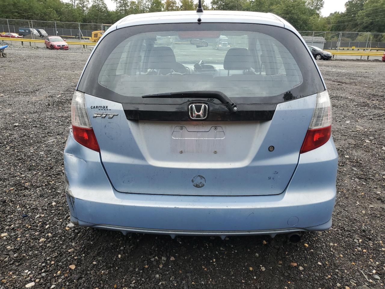 2009 Honda Fit VIN: JHMGE88239S042506 Lot: 82356635