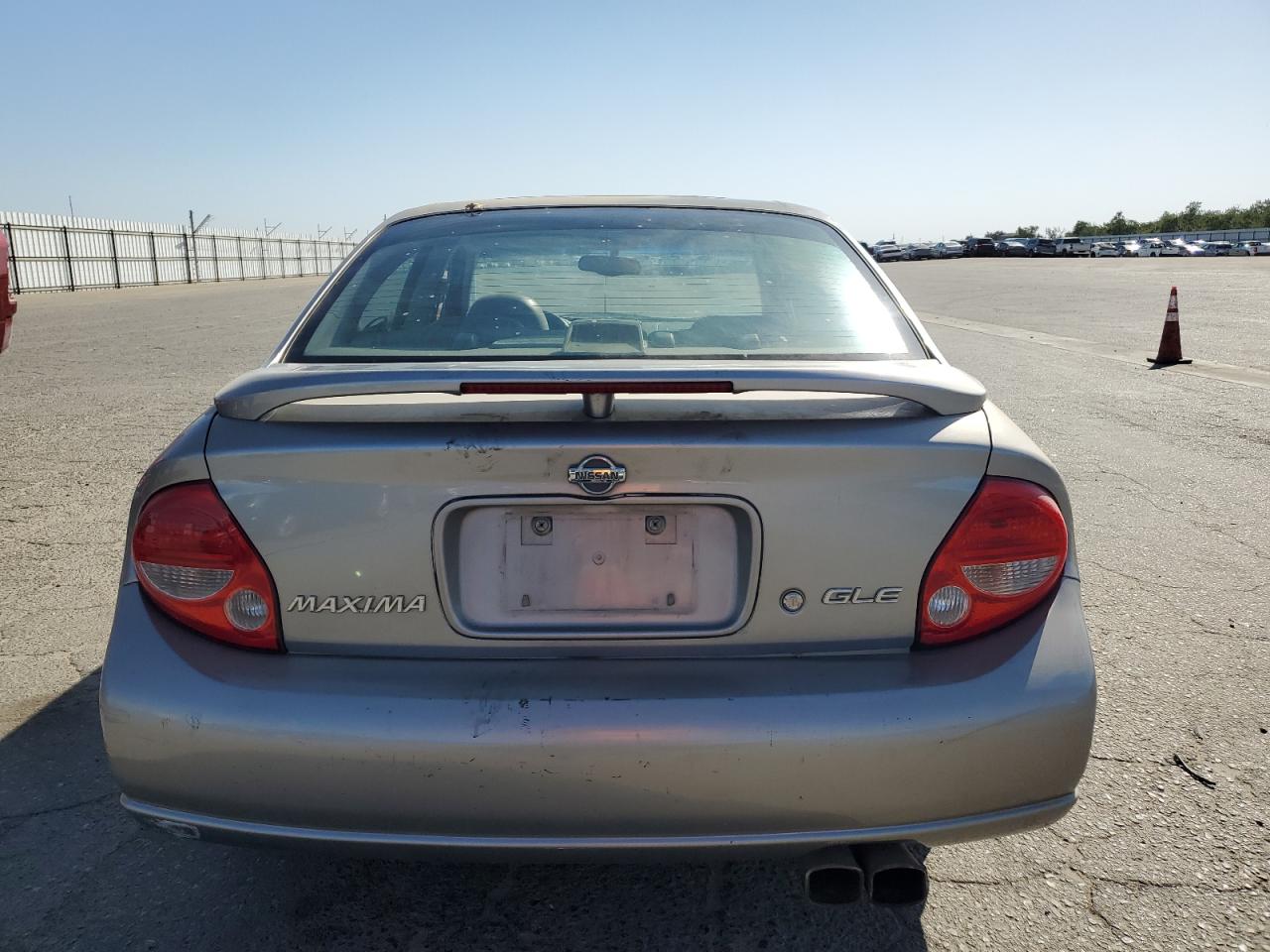 2001 Nissan Maxima Gxe VIN: JN1CA31DX1T610861 Lot: 85085375