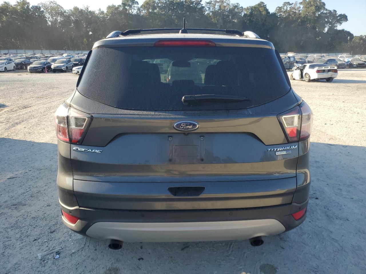2017 Ford Escape Titanium VIN: 1FMCU9JD8HUB43916 Lot: 82660875