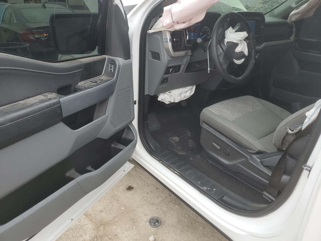 2023 Ford F150 VIN: 1FTMF1C58PKE22075 Lot: 82773595