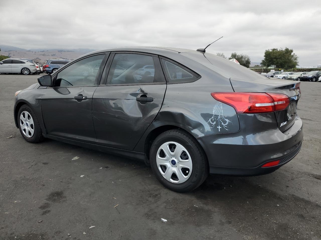 2017 Ford Focus S VIN: 1FADP3E21HL206291 Lot: 82283455