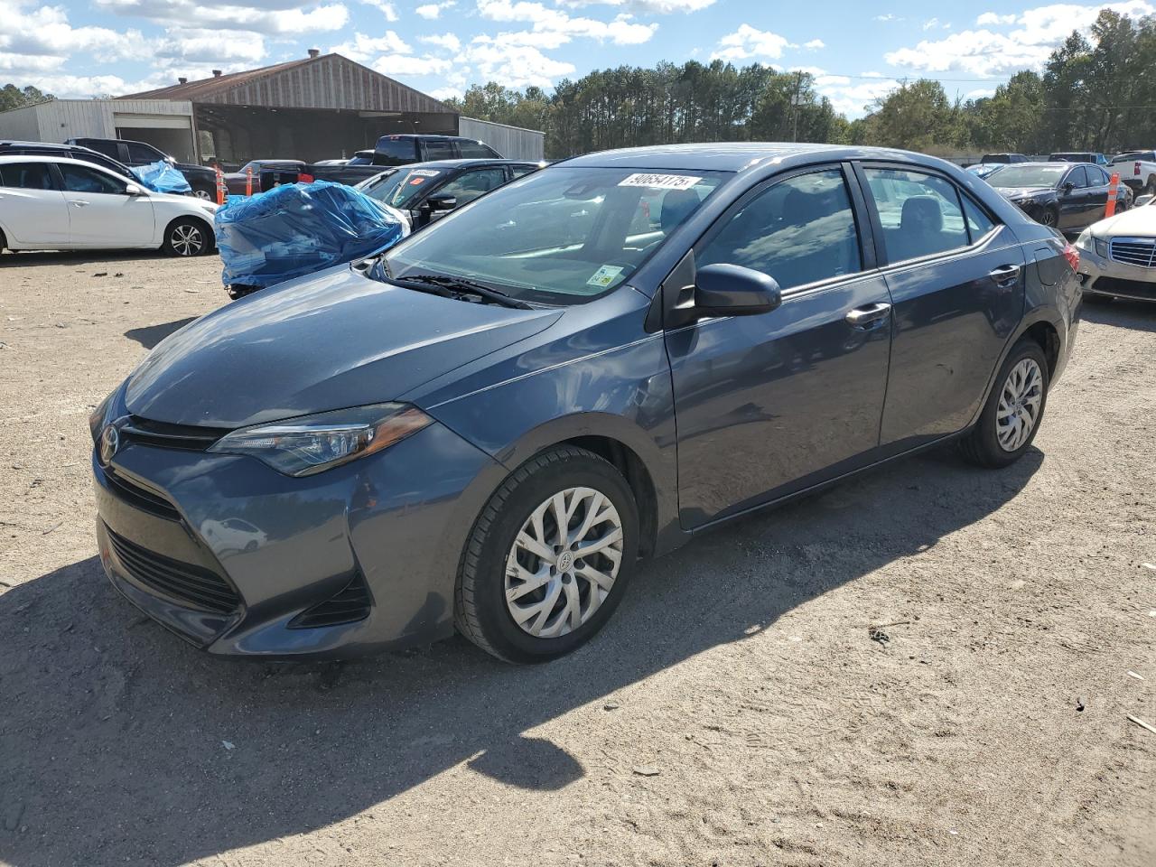 2018 Toyota Corolla L VIN: 5YFBURHE7JP810475 Lot: 90654175