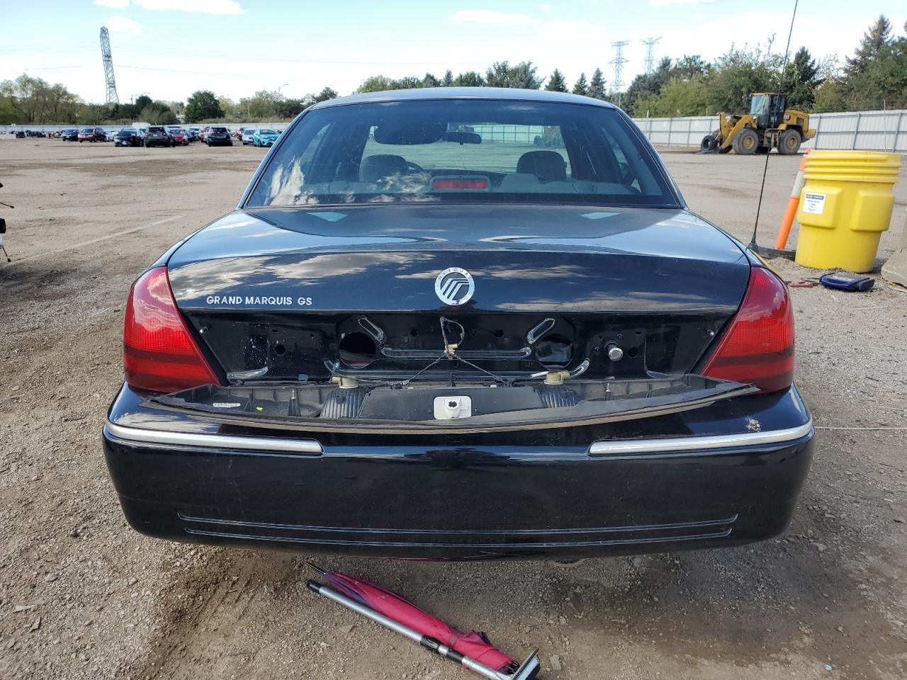 2005 Mercury Grand Marquis Gs VIN: 2MEFM74W95X659594 Lot: 84277265