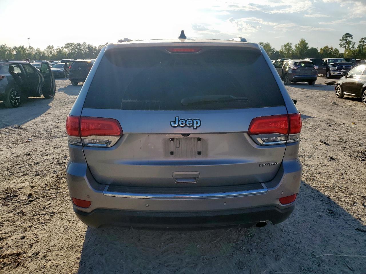 2015 Jeep Grand Cherokee Limited VIN: 1C4RJEBG6FC707400 Lot: 82242465