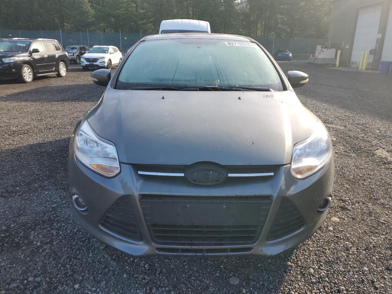 2014 Ford Focus Se VIN: 1FADP3F29EL288037 Lot: 82712575