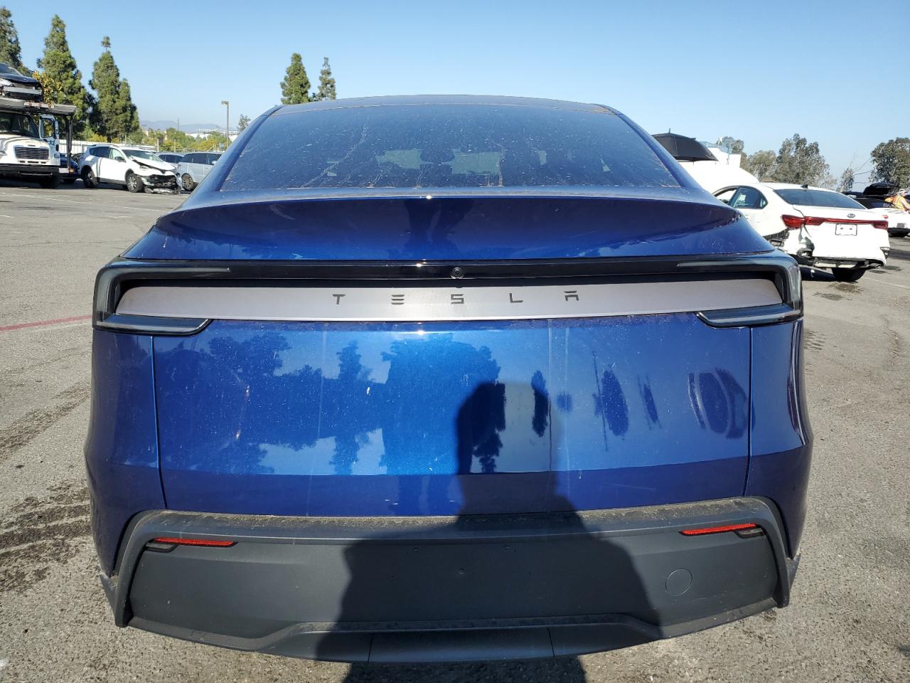 2026 Tesla Model Y VIN: 7SAYGDED5TF424140 Lot: 84655355